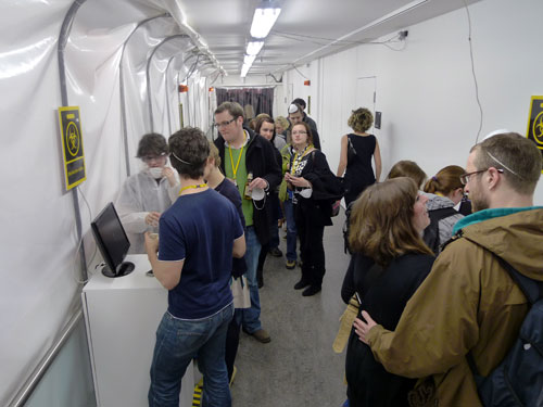 Queuing to get healed at the disinfection stations.